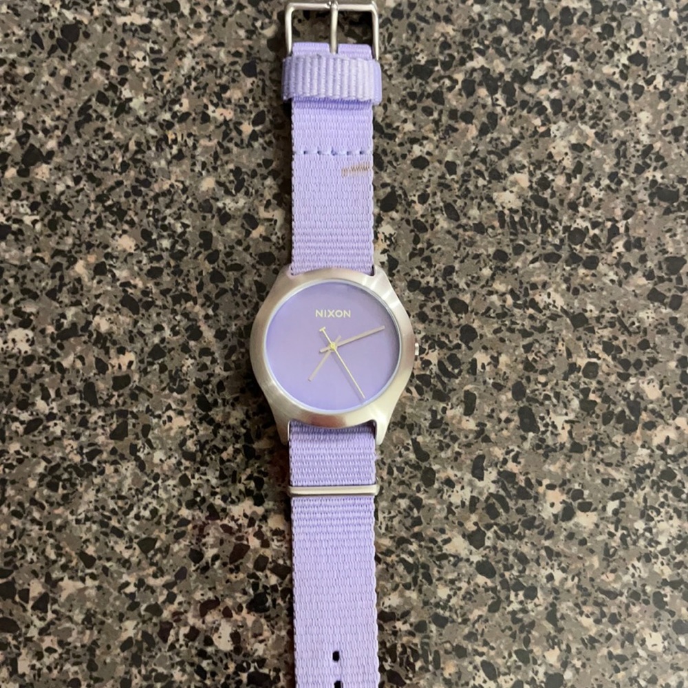 Nikon Purple unisex watch valued $150 asking $40